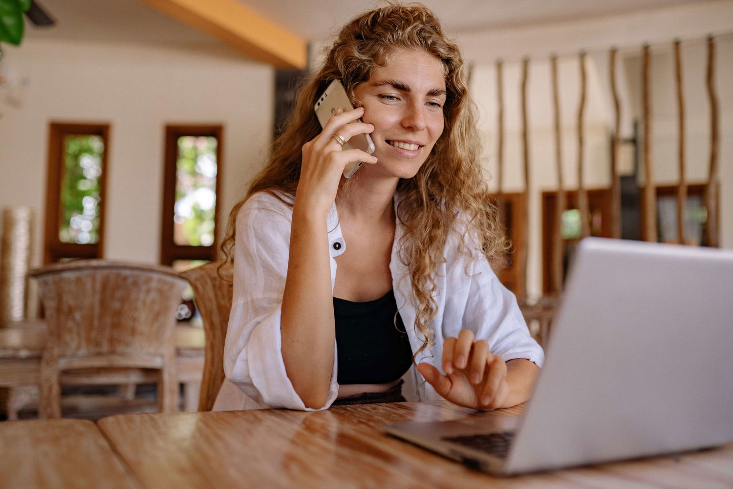  woman works on laptop